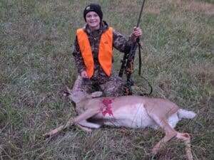 Teenager with Deer that he successfully hunted